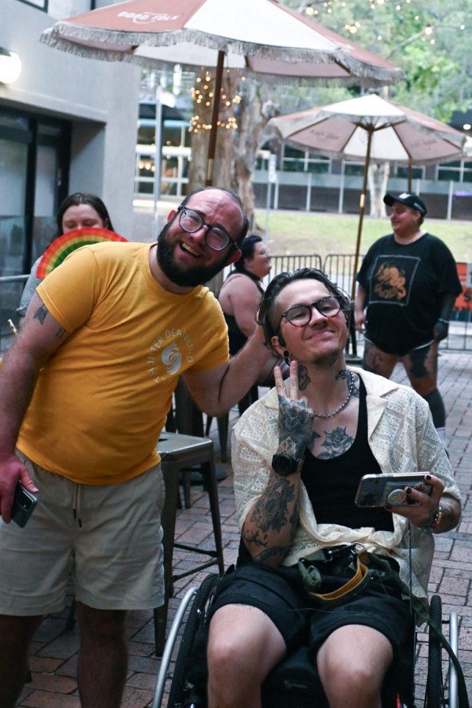 Az Cosgrove and Bryson at a cafe